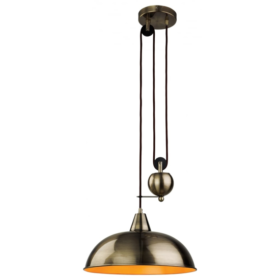 Rise and fall pendant light in an antique brass finish with copper insert